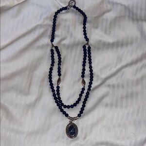Elegant Blue Beaded Necklace with Silver Accents Blue pendant in Silver Tone
